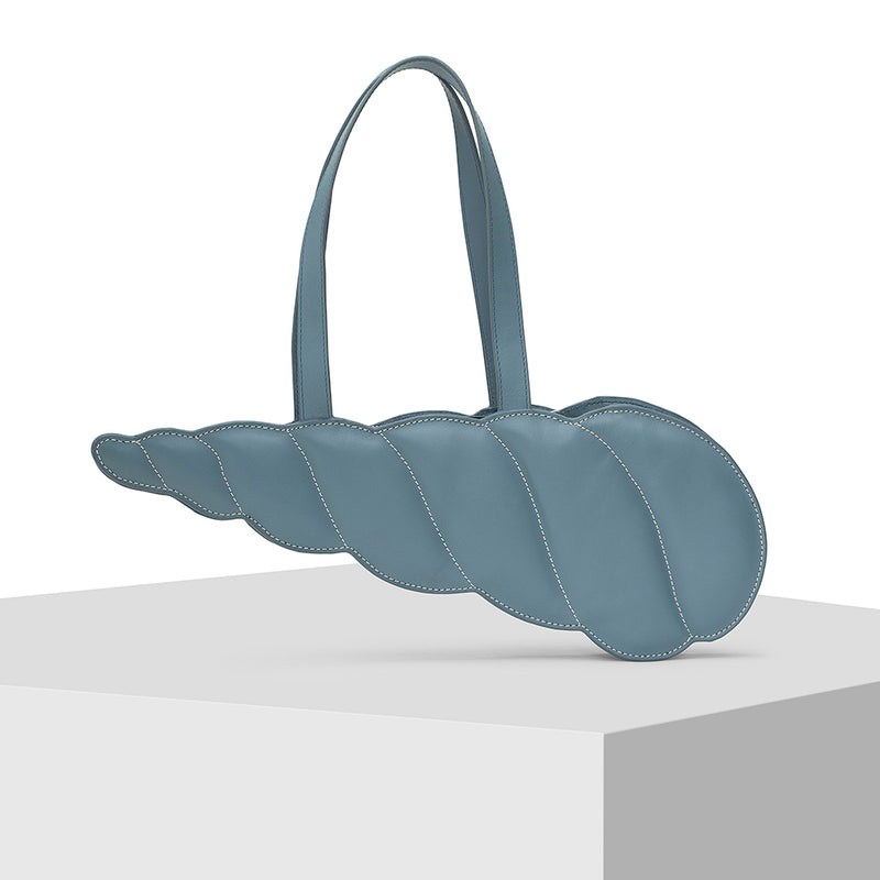 Elongated shell shape Blue Leather Tote Bag Designed by Nitya Arora