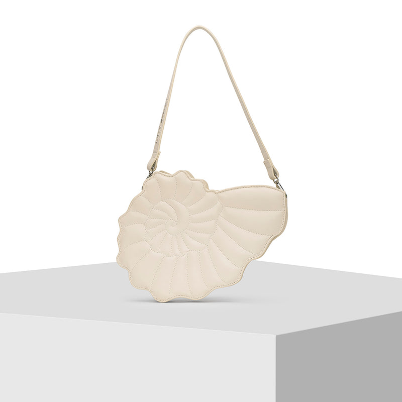 Buy Sea Shell Shape Cream Leather Tote Bag Designed by Nitya Arora