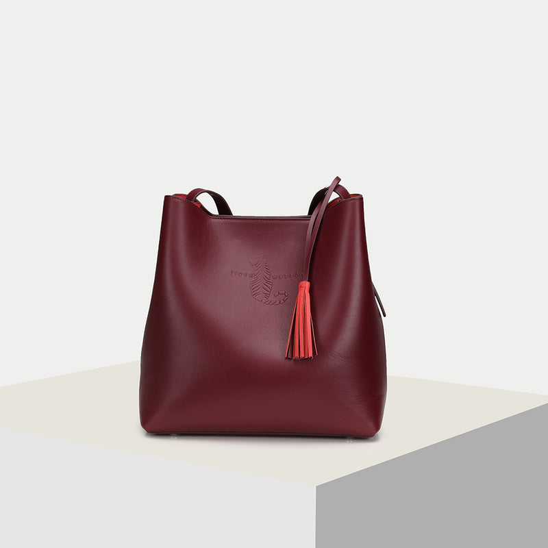 Burgundy leather tote bags