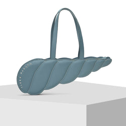 Elongated shell shape Blue Leather Tote Bag by Tiger Fish